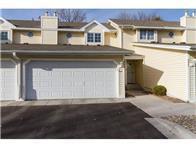Side by side townhouse with 2 car attached garage, plus 2 parking spaces in front of the unit.