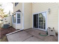 Unit has a private patio just off the dining room.