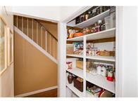 Built-in pantry gives plenty of storage.