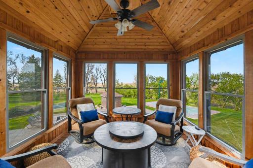 Enjoy relaxing in the screened in sunroom