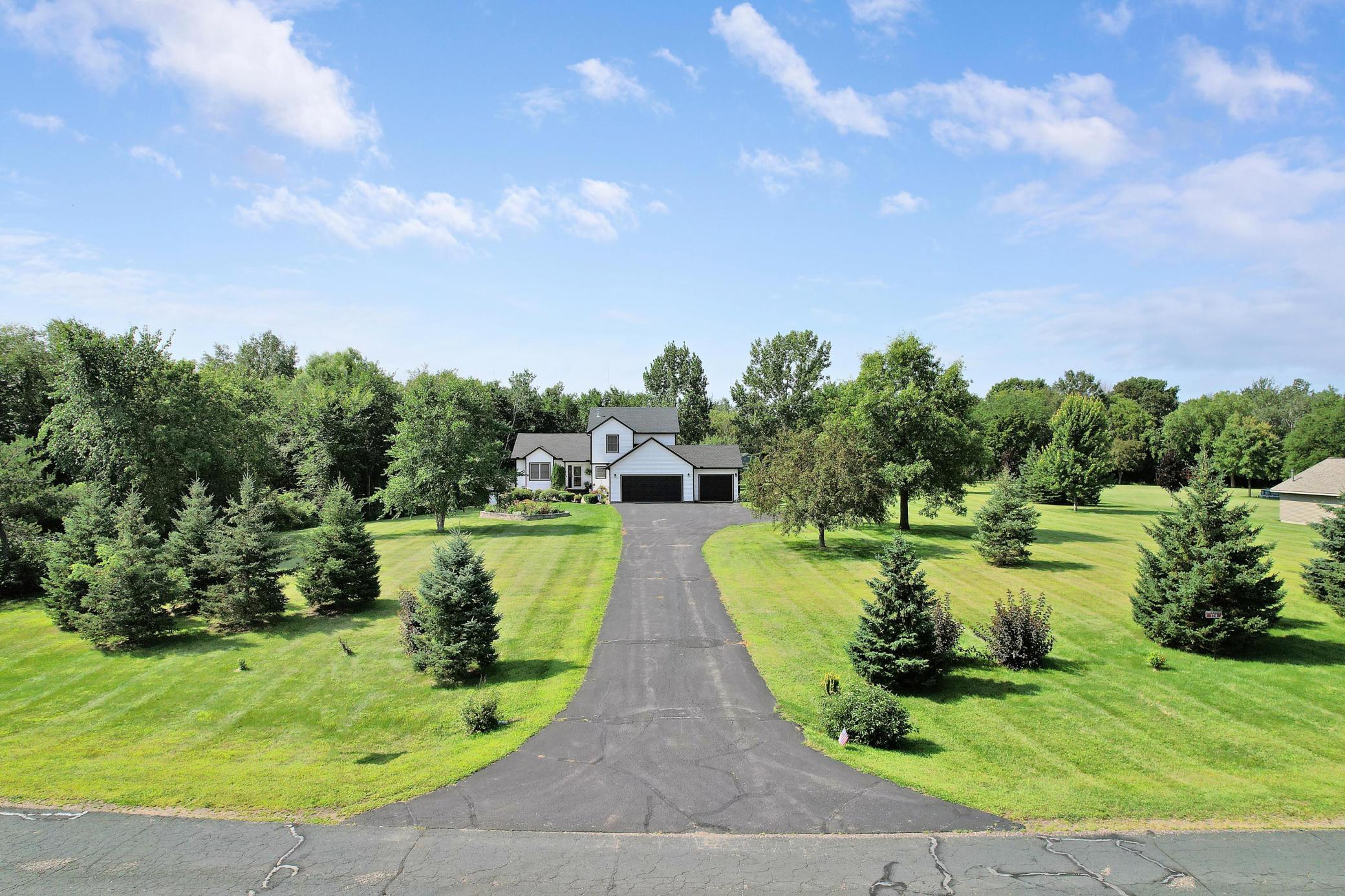 Welcome to your private 2.34-acre Hudson retreat — where peaceful surroundings, mature trees, and country-like serenity meet the convenience of being just minutes from town!