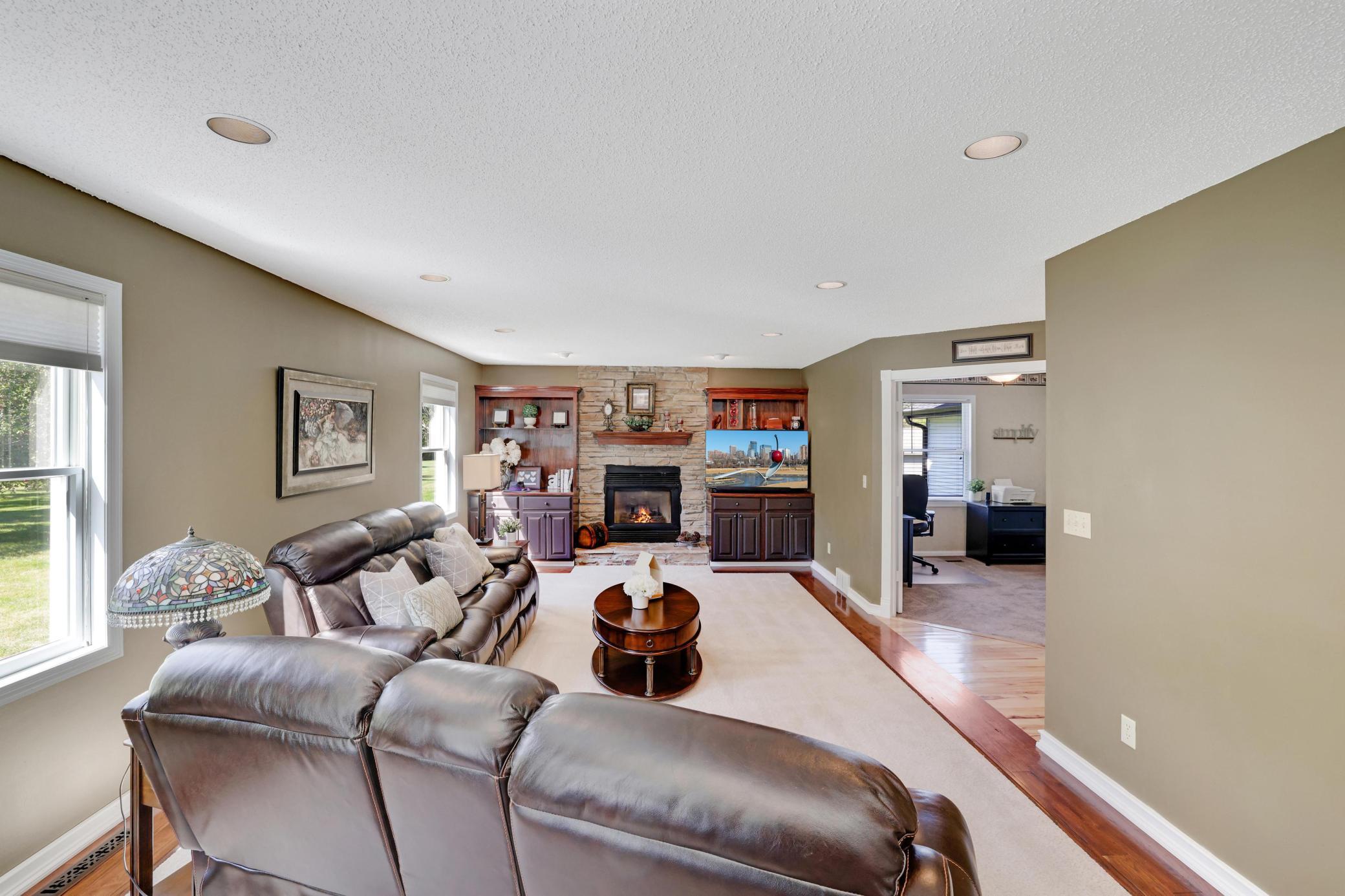 Main Level Living Area w/ built-ins and gas burning fireplace