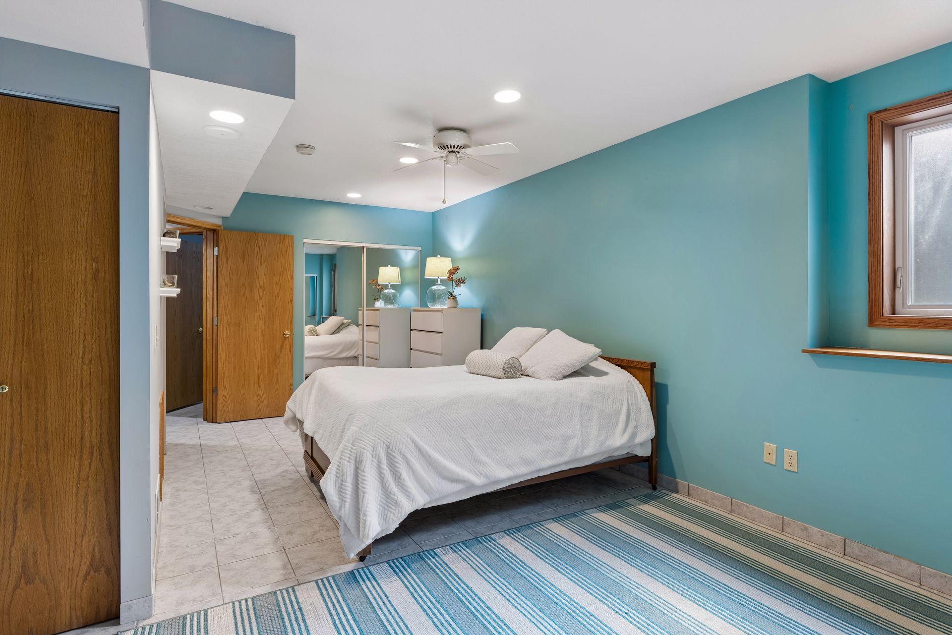 This room features dual closets, one on either end of the room.