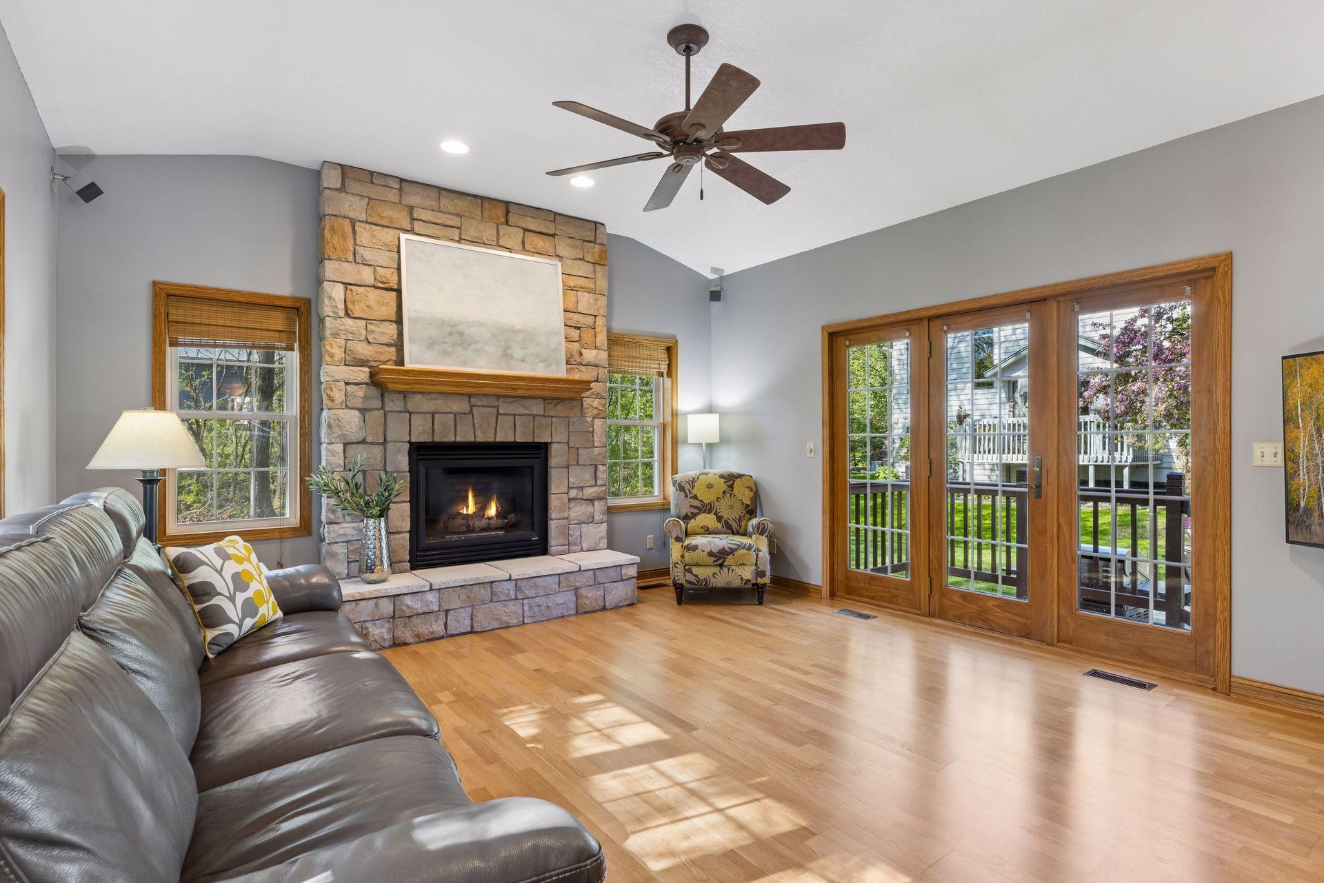 Glass doors lead out to the rear patio.