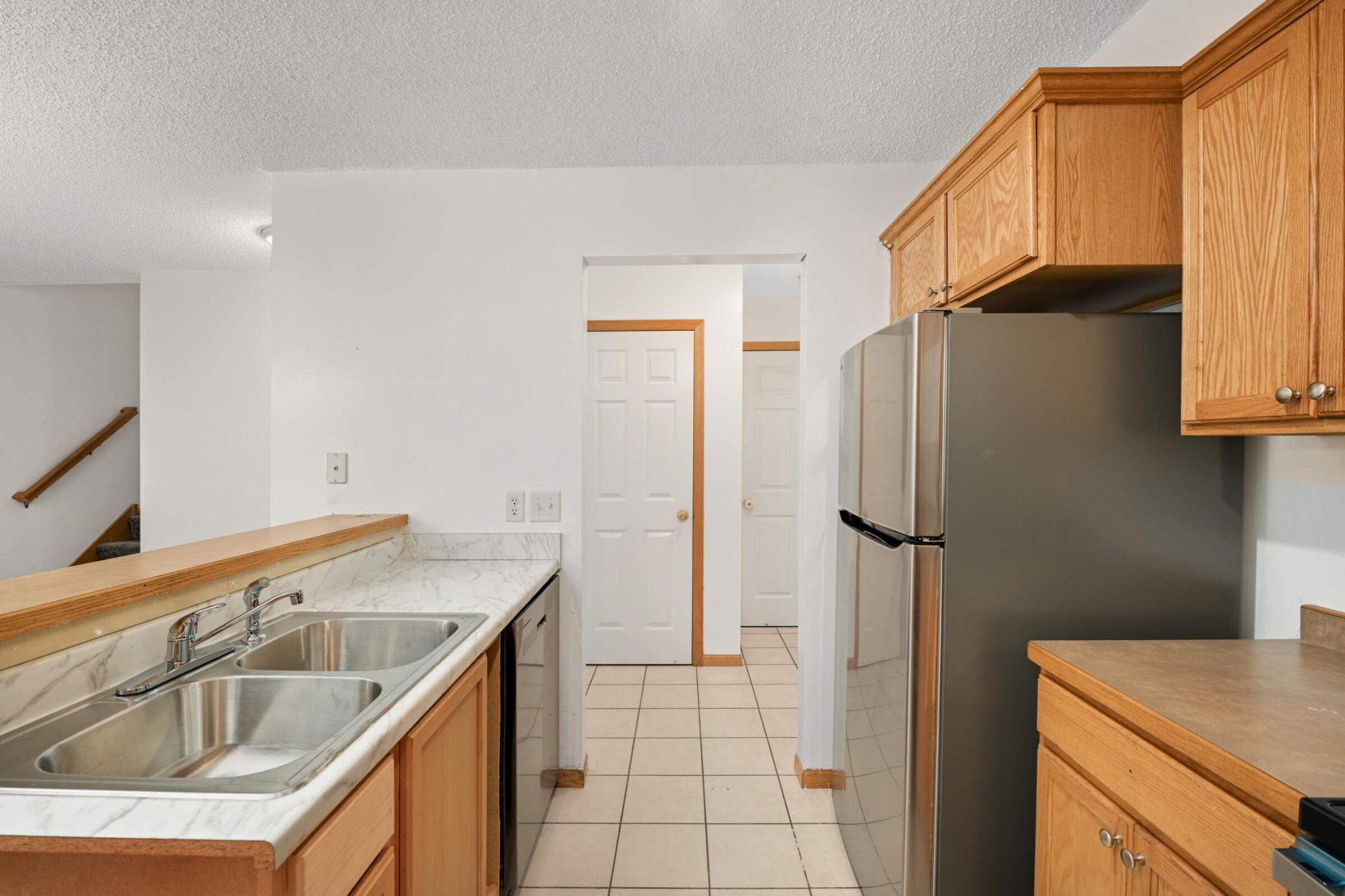 All-new countertops and appliances (incl. stainless fridge and dishwasher)
