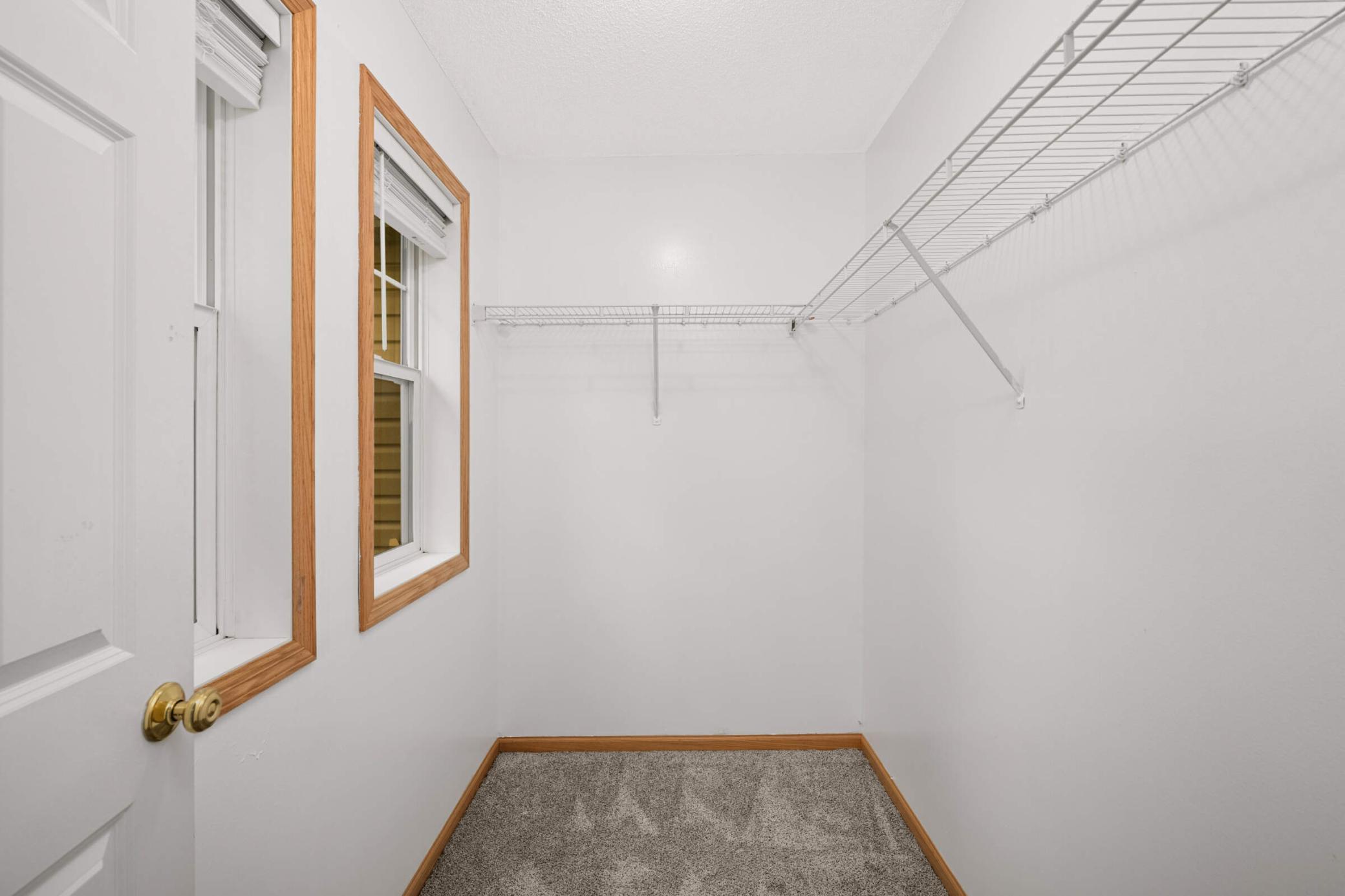 Large walk-in closet in primary suite