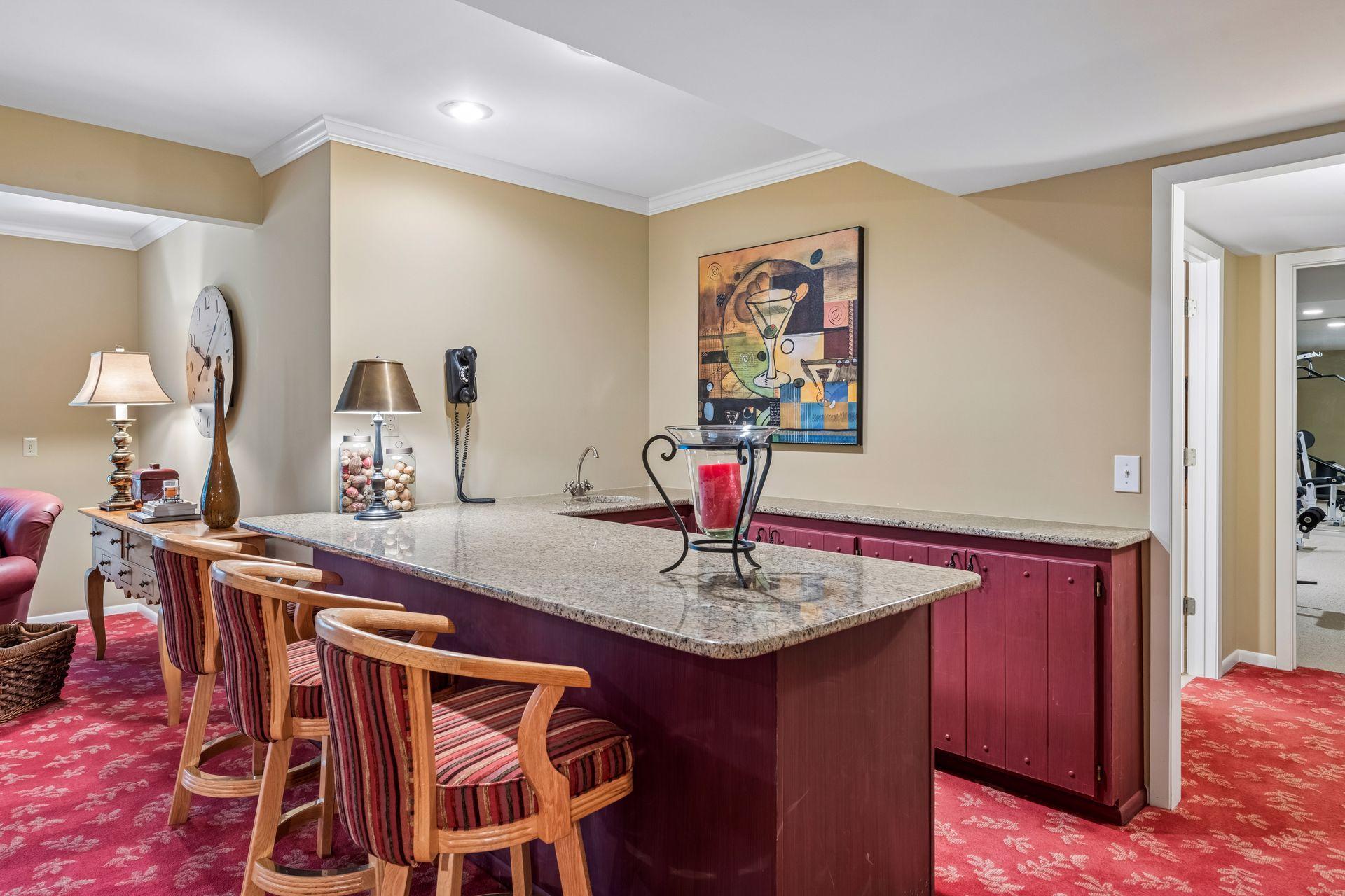 Wet bar with sink and plenty of cabinet space