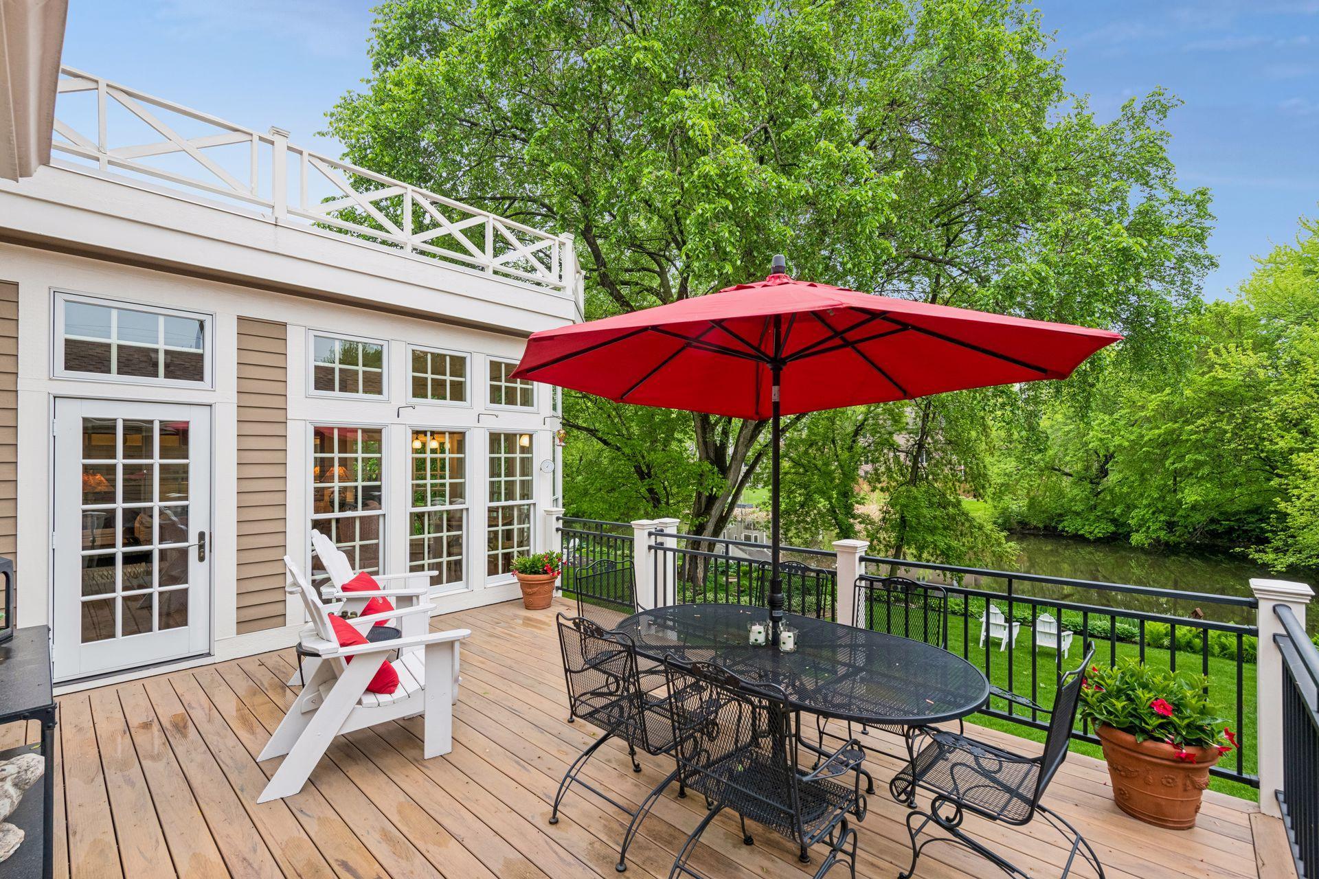 Step out onto the deck from the main level to discover sweeping views of the pond