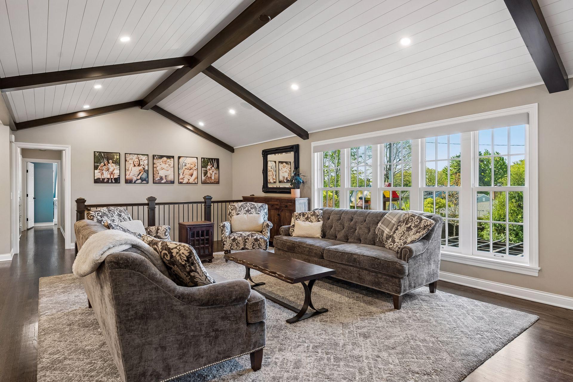Living Room w/ Vaulted, Beamed, Wood Planked Ceiling & Sonos Sound System