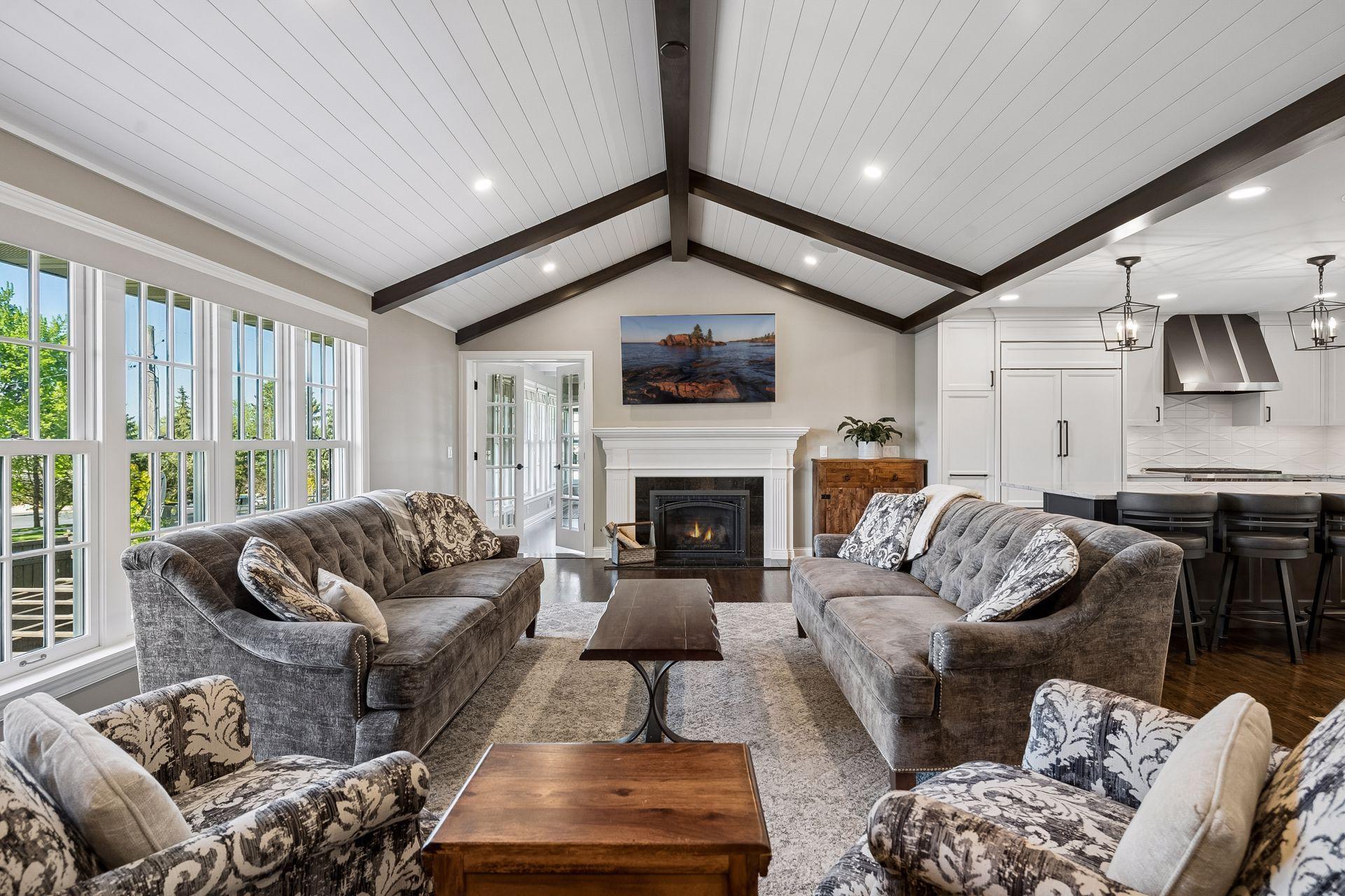 Living Room w/ Vaulted, Beamed, Wood Planked Ceiling & Sonos Sound System