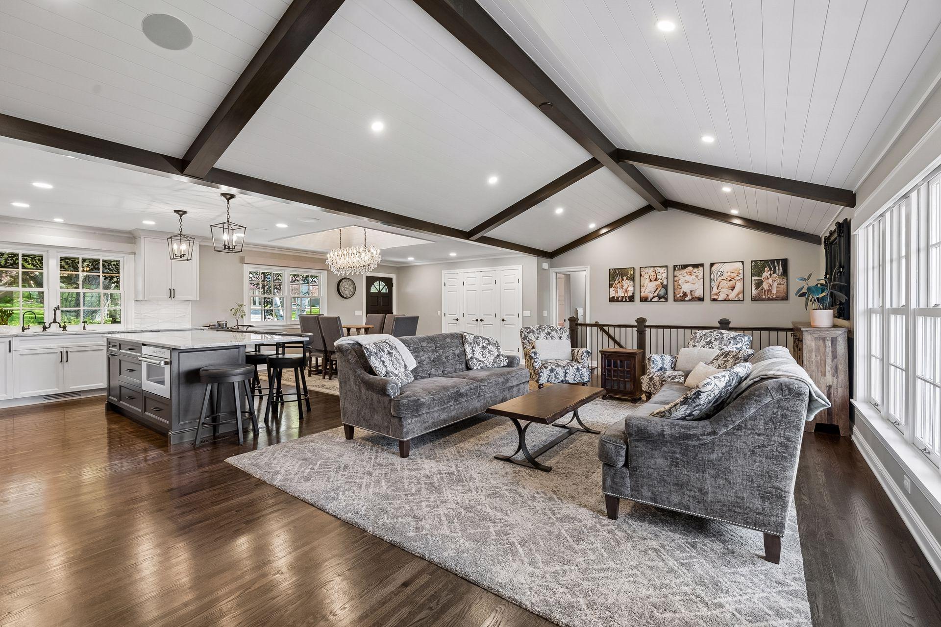 Living Room w/ Vaulted, Beamed, Wood Planked Ceiling & Sonos Sound System