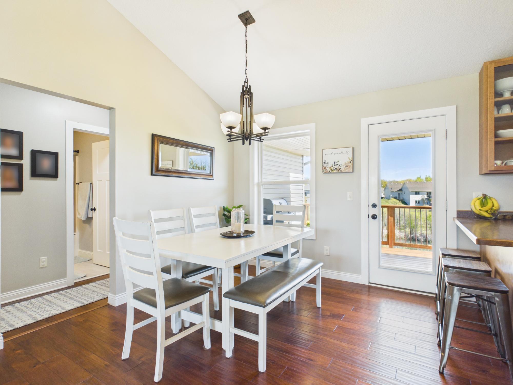 The door in the dining area takes you to the covered deck.