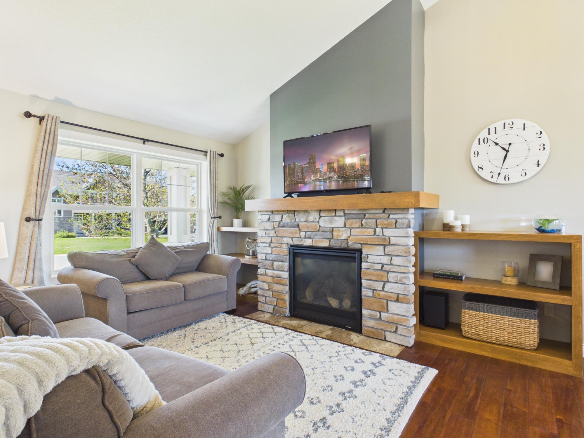 While warming up in front of the gas fireplace, you can see North Lindstrom Lake from your chair.