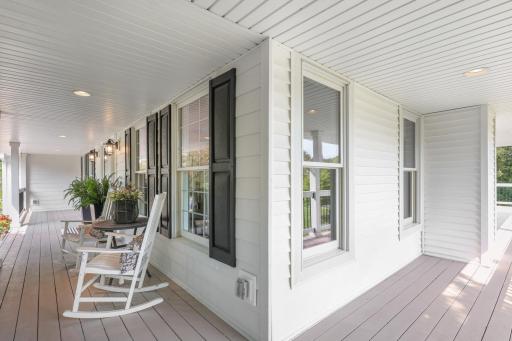 Wraps around the entire home connecting to the back deck and screened in patio.