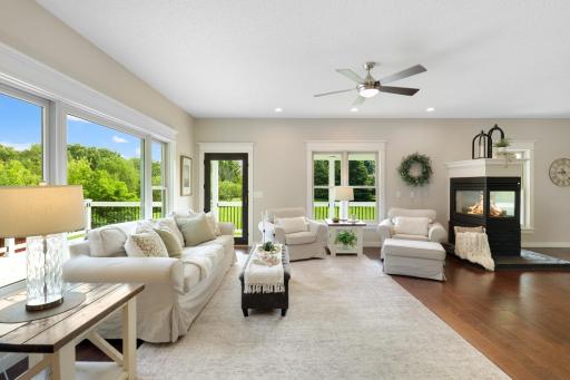 Sun-filled family room with beautiful views of the private, picturesque acreage.