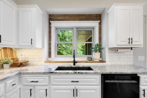Beautiful kitchen window above the sink. Looks out to the beautiful backyard.