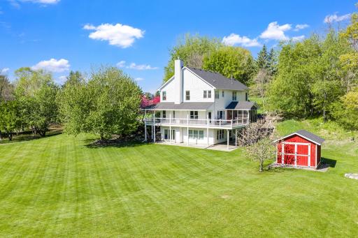 Stunning acerage with storage shed.