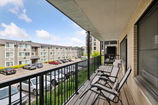 Relax on your spacious private balconyâperfect for morning coffee, evening unwinding, or taking in the vibrant energy of this lakeside neighborhood just blocks from the Chain of Lakes and Greenway trails.