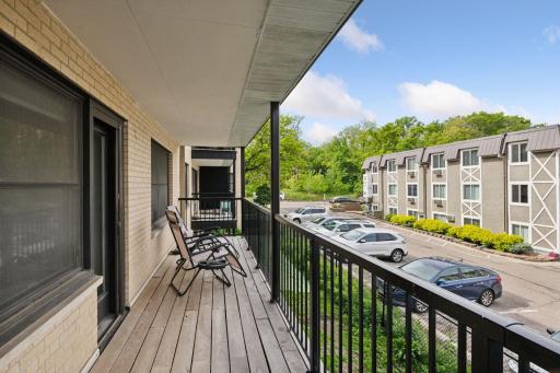 Relax on your spacious private balconyâperfect for morning coffee, evening unwinding, or taking in the vibrant energy of this lakeside neighborhood just blocks from the Chain of Lakes and Greenway trails.