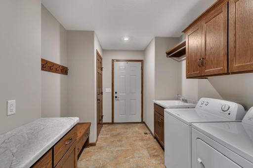 Laundry w folding counter & storage space