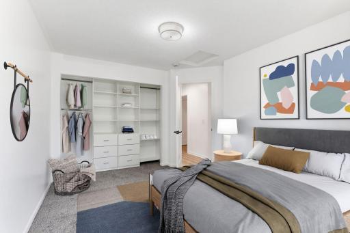 Spacious, updated finishes, and a functional layout designed for comfort and relaxation. The open closet system offers excellent storage and organization. Photo has been virtually staged.