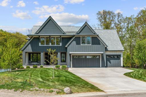 Architecturally stunning LIKE NEW custom home by Hartman Homes