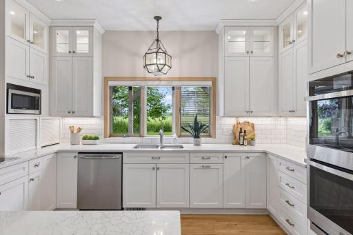 Updated kitchen with double wall ovens and custom cabinets