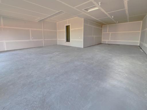 3171 Jandura Ave NE- 4 BAY GARAGE offering an abundance of storage and work space.