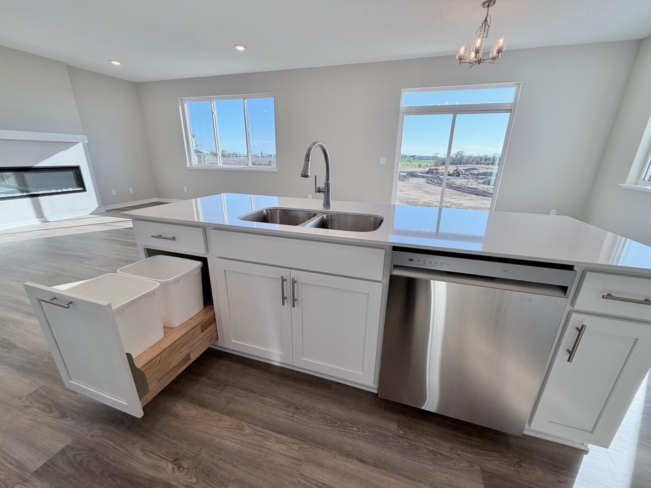 PHOTO OF A DIFFERENT HOME WITH SIMILAR PLAN. FINISHES MAY VARY.