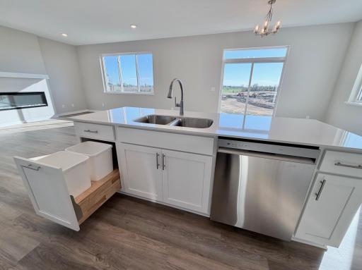 PHOTO OF A DIFFERENT HOME WITH SIMILAR PLAN. FINISHES MAY VARY.