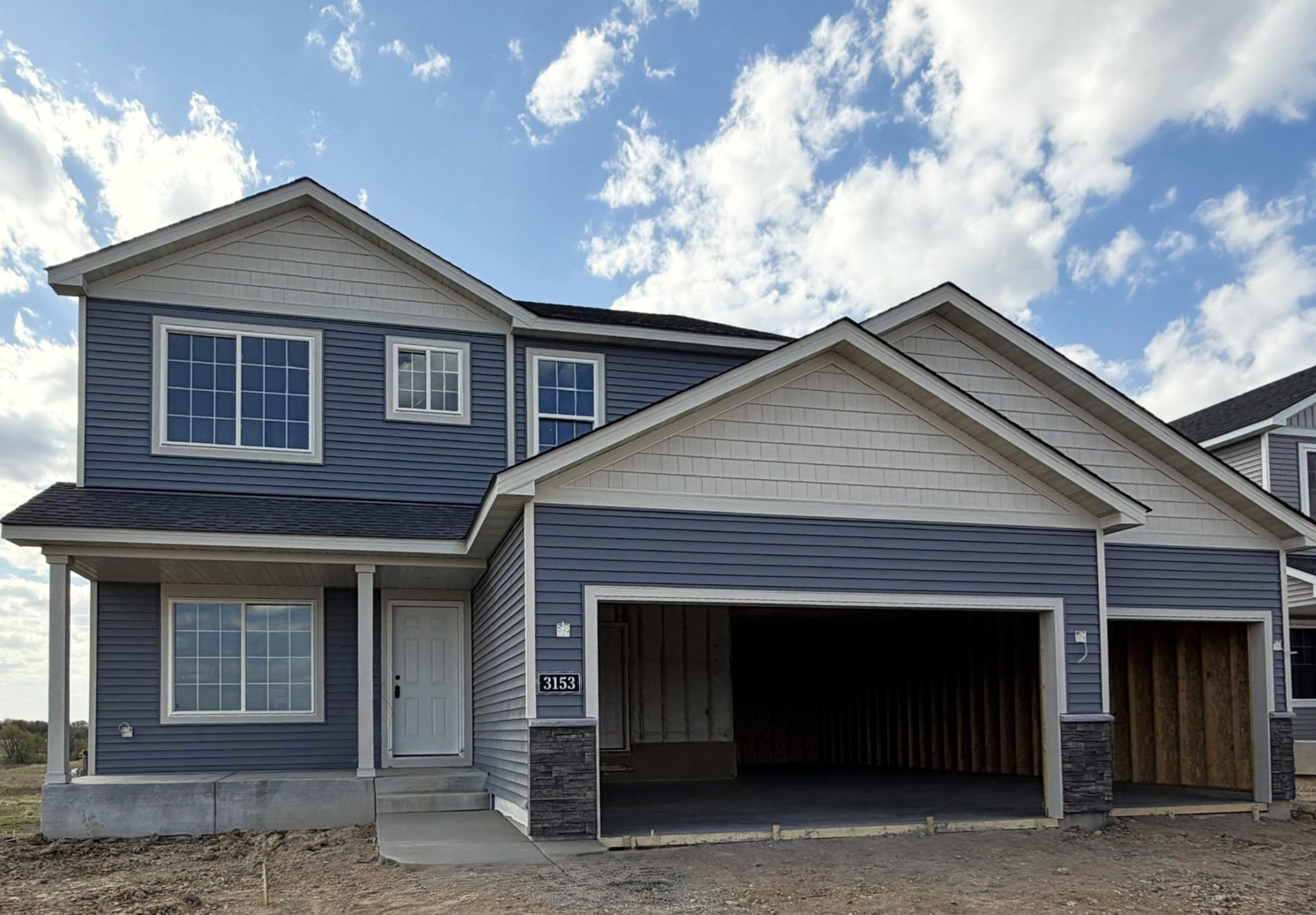 3153 Jandura Ave NE- Home will be complete and ready for Move-in on 6/16/2026! Highlights include a 4 BAY GARAGE on a Walkout Homesite! Garage Doors will be installed soon. Sod, Irrigation System, and Front Plantings are included.