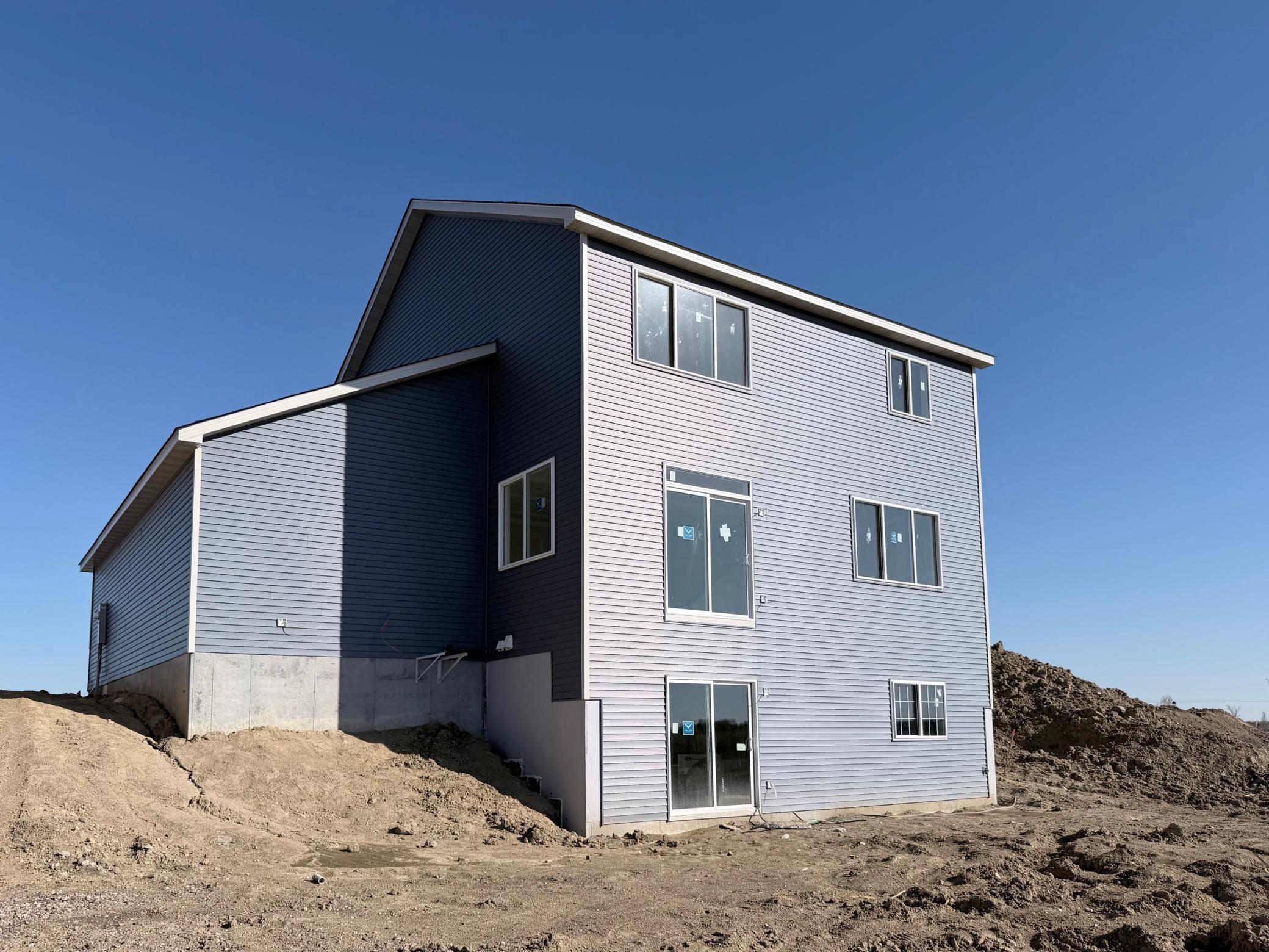 3153 Jandura Ave NE- Home features a Walkout Lower Level to spacious backyard.