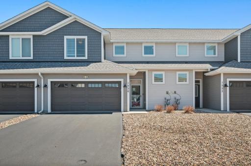 Well-kept townhome with attached garage, private entry