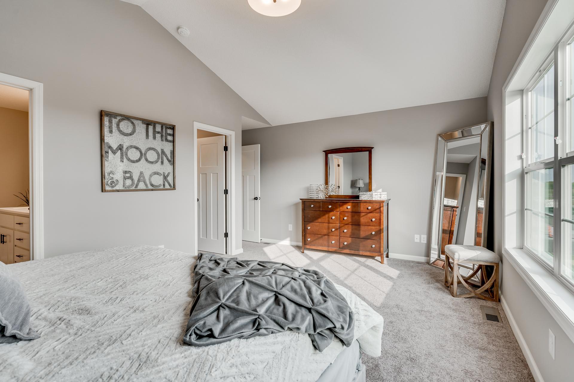 Photos are of a like home in different location. Options may be different in actual home. Actual home has no stone on the front.