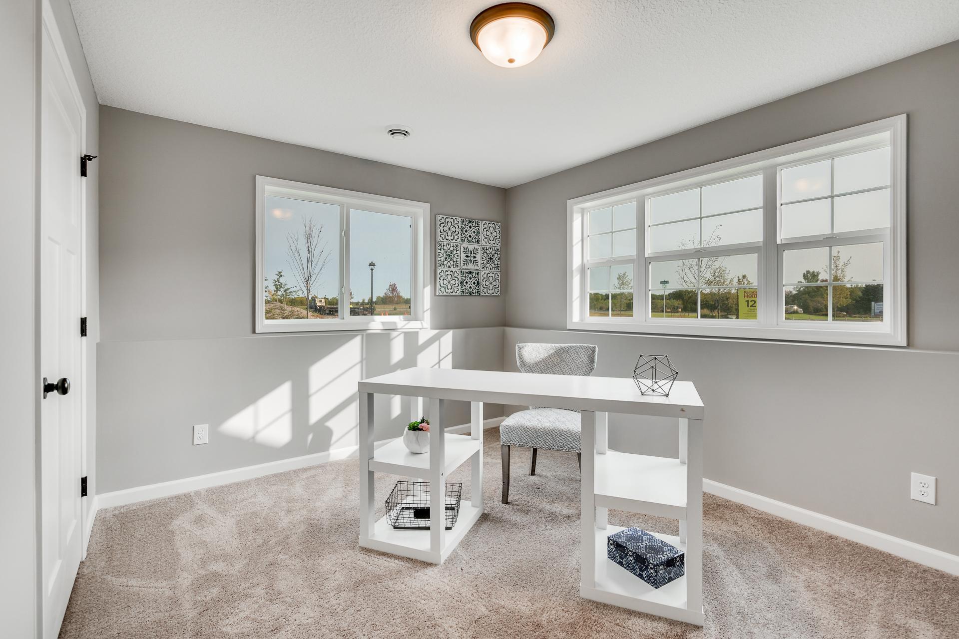 Photos are of a like home in different location. Options may be different in actual home. Actual home has no stone on the front.