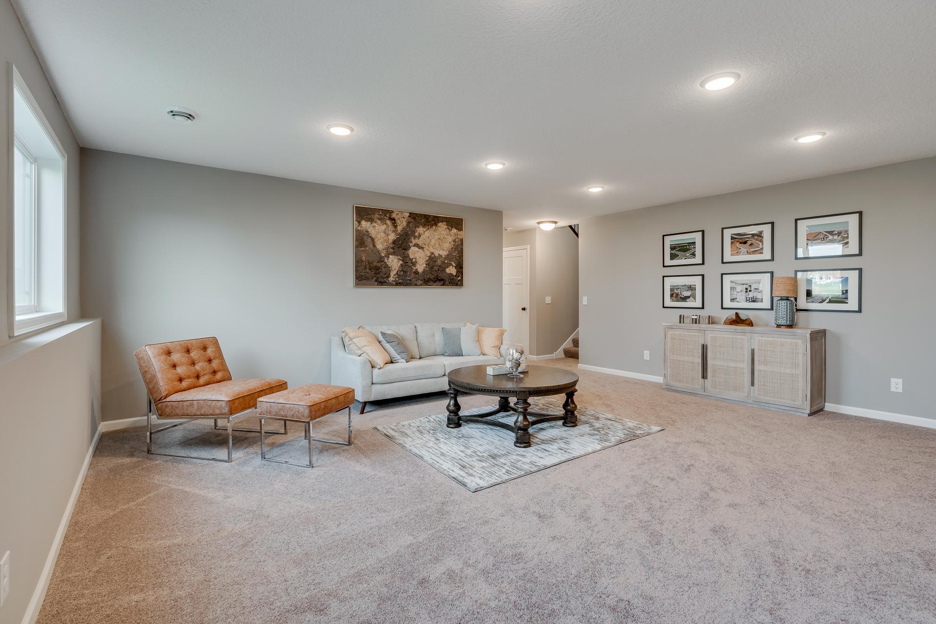 Photos are of a like home in different location. Options may be different in actual home. Actual home has no stone on the front.