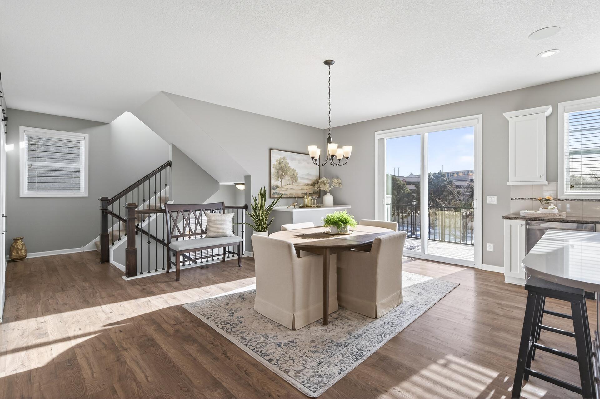 Entertaining is a dream in this beautiful dining area that leads to the maintenance free deck
