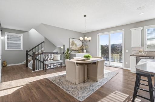Entertaining is a dream in this beautiful dining area that leads to the maintenance free deck