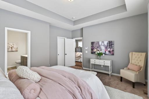 Primary bedroom has a private bath and large walk-in closet