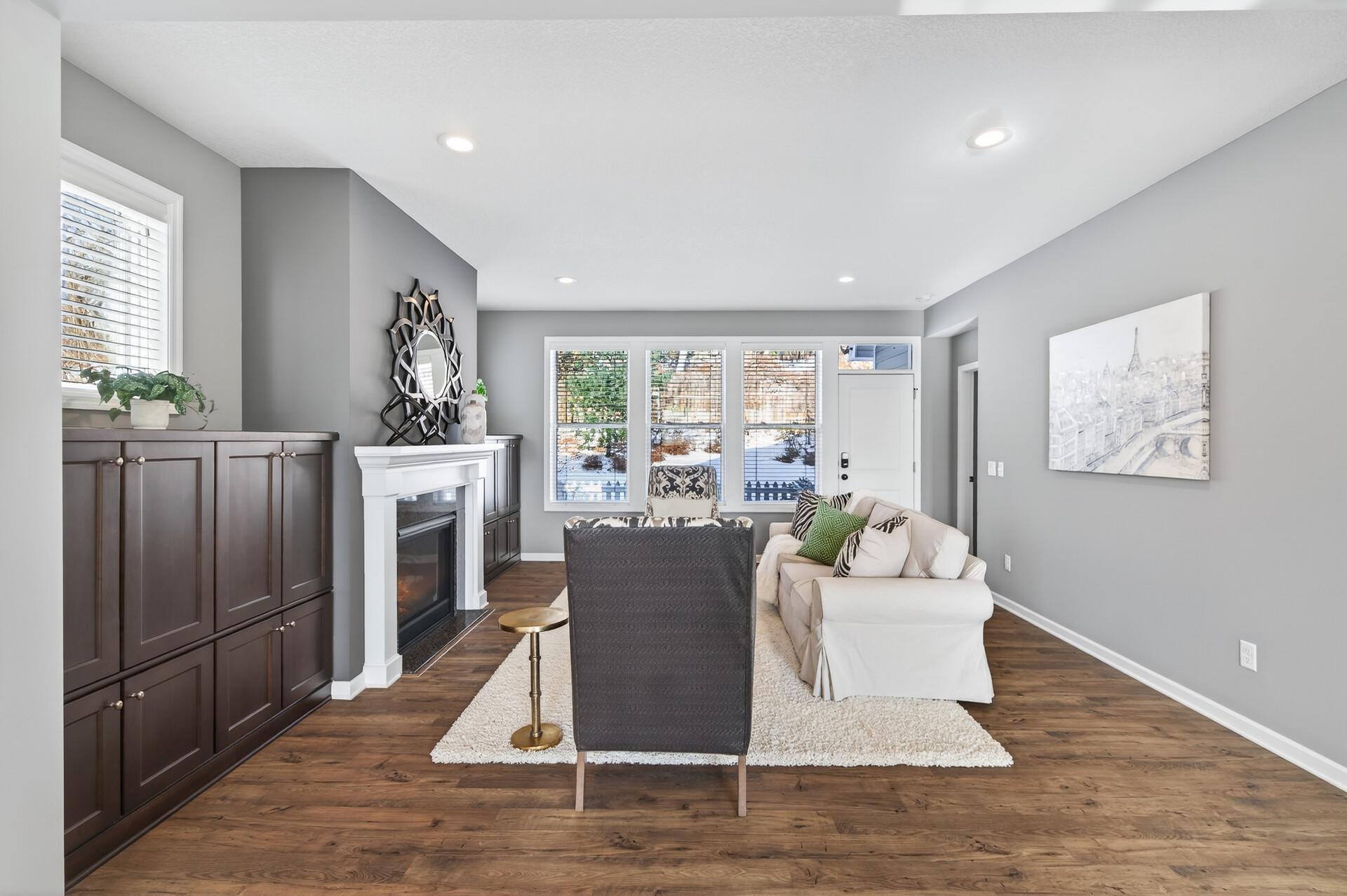 Large windows provide so much light and a view of the private backyard