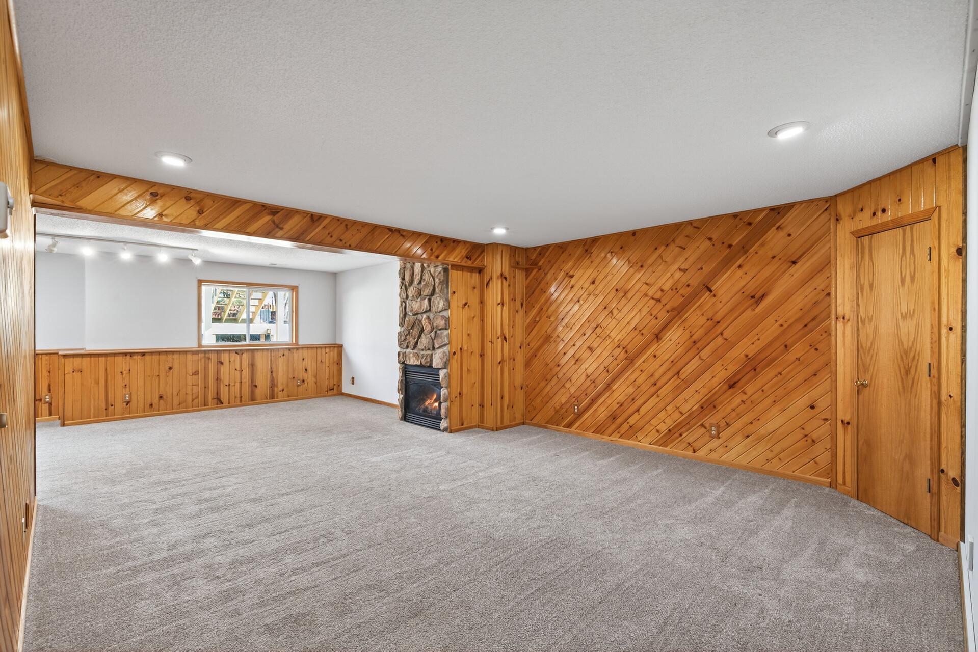 Spacious family room with gorgeous hardwood accents