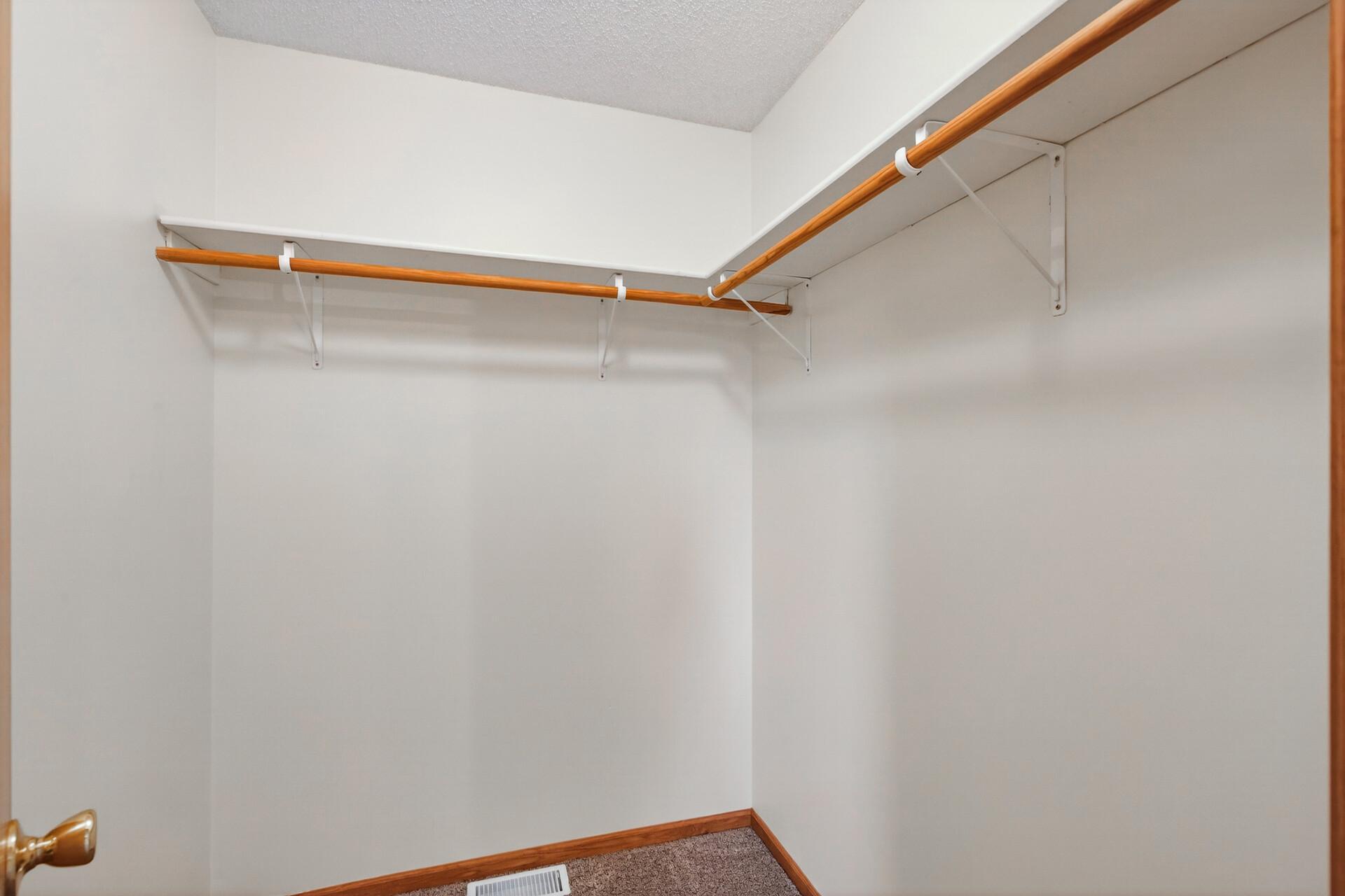 Bedroom with walk in closet.