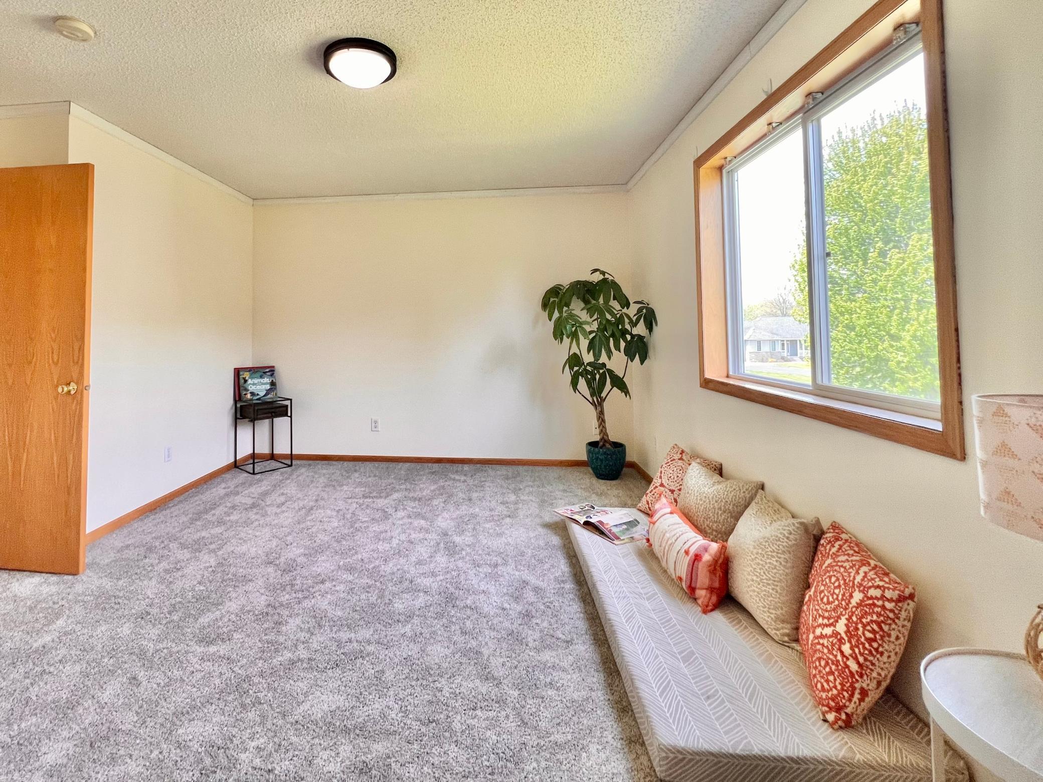 New carpet and light fixture.