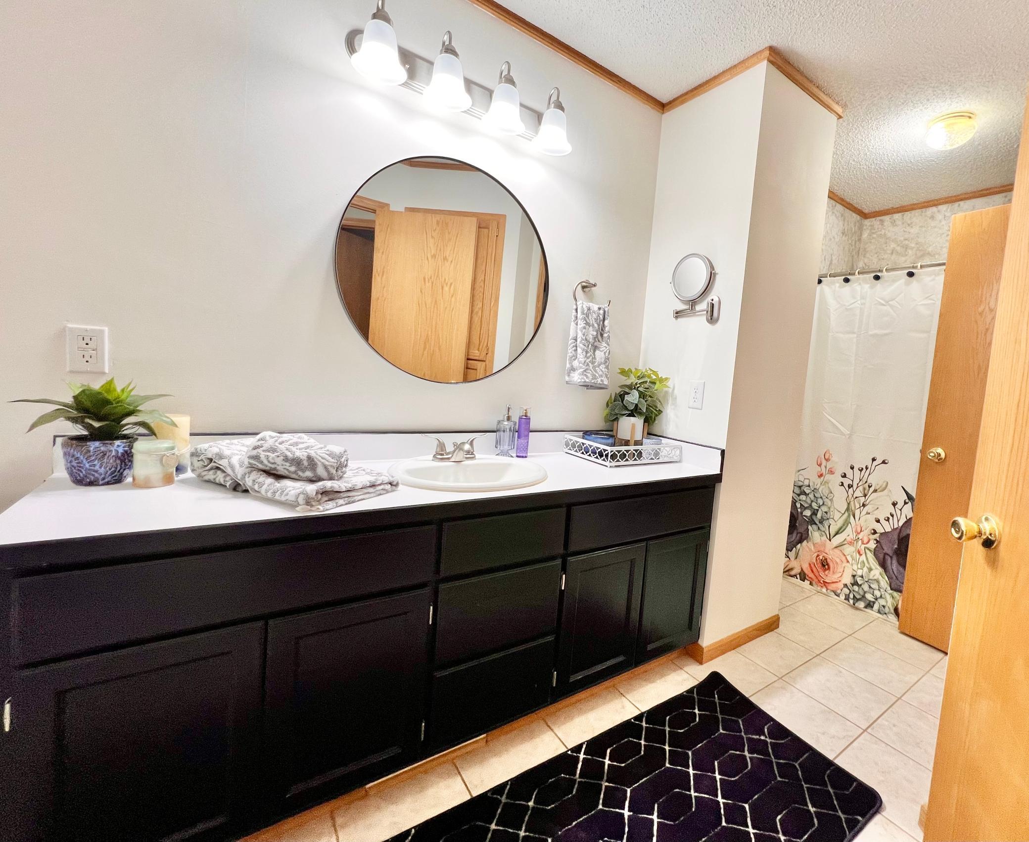 Generously sized bathroom on main level