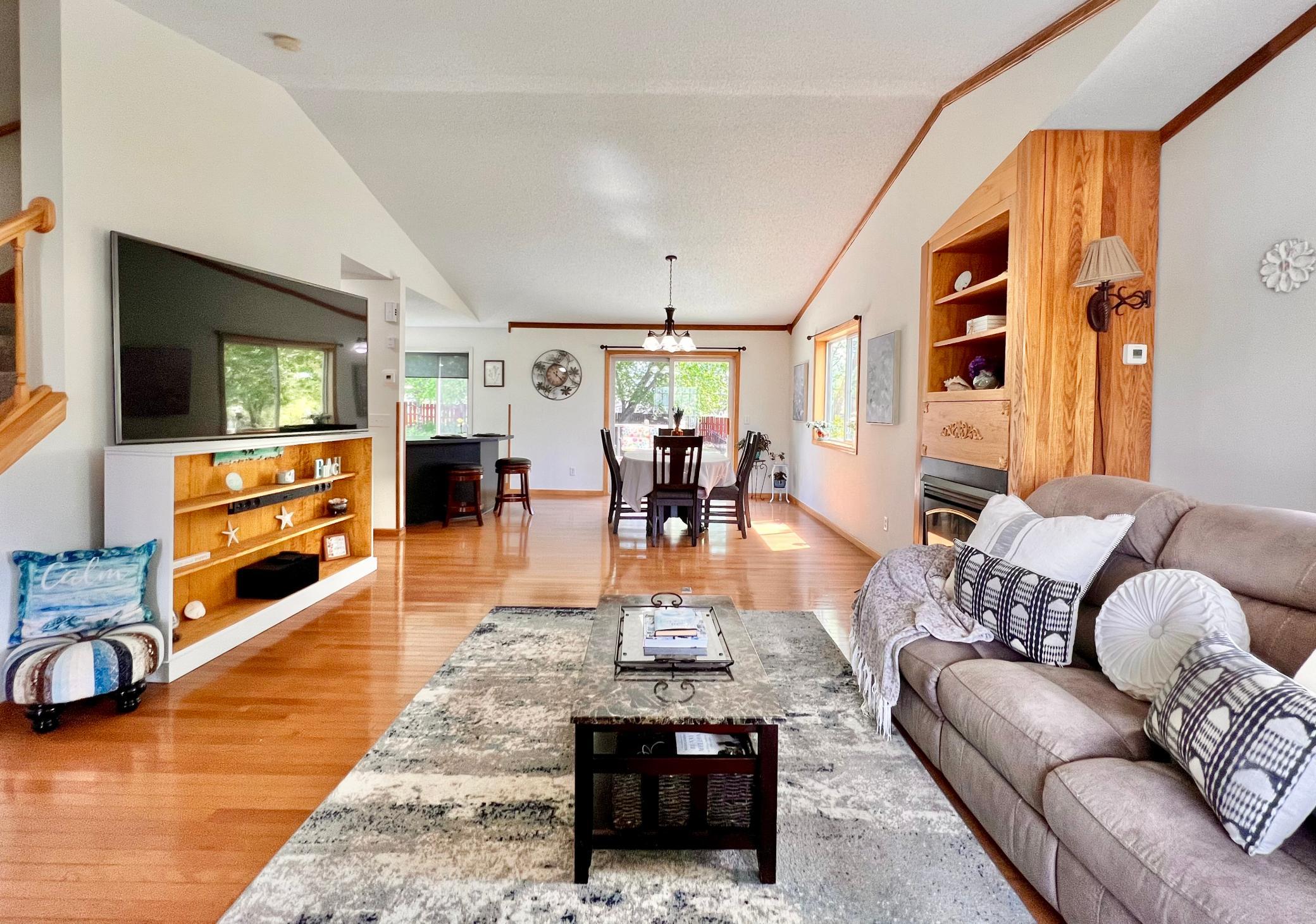 Vaulted ceilings in this ML creating a spacious and bright space.