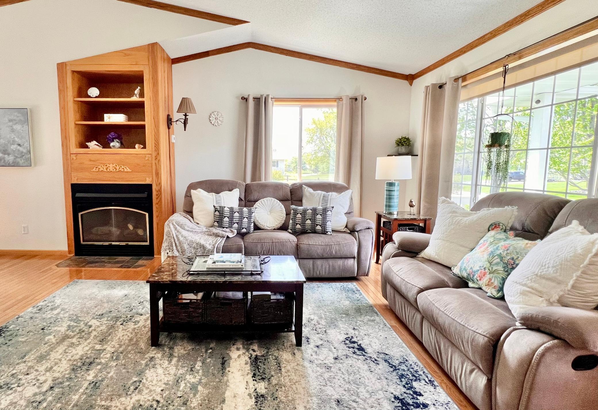 Anchor the main living area with the warmth and charm with the fireplace.