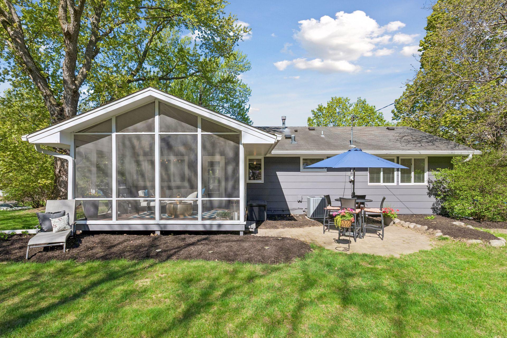 Enjoy the summer on the paver patio, tucked away for privacy.