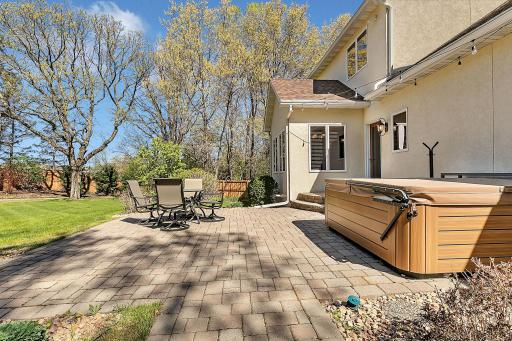 Spacious patio perfect for outdoor dining, gatherings, and summer evenings.