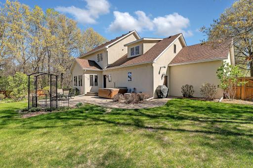 Thoughtfully designed back exterior enhances outdoor enjoyment.