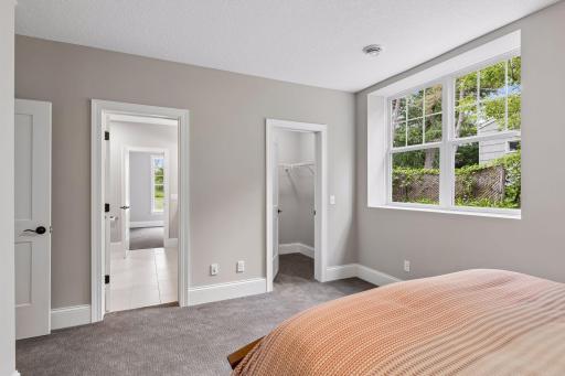 lower level bedroom with walk-thru bath